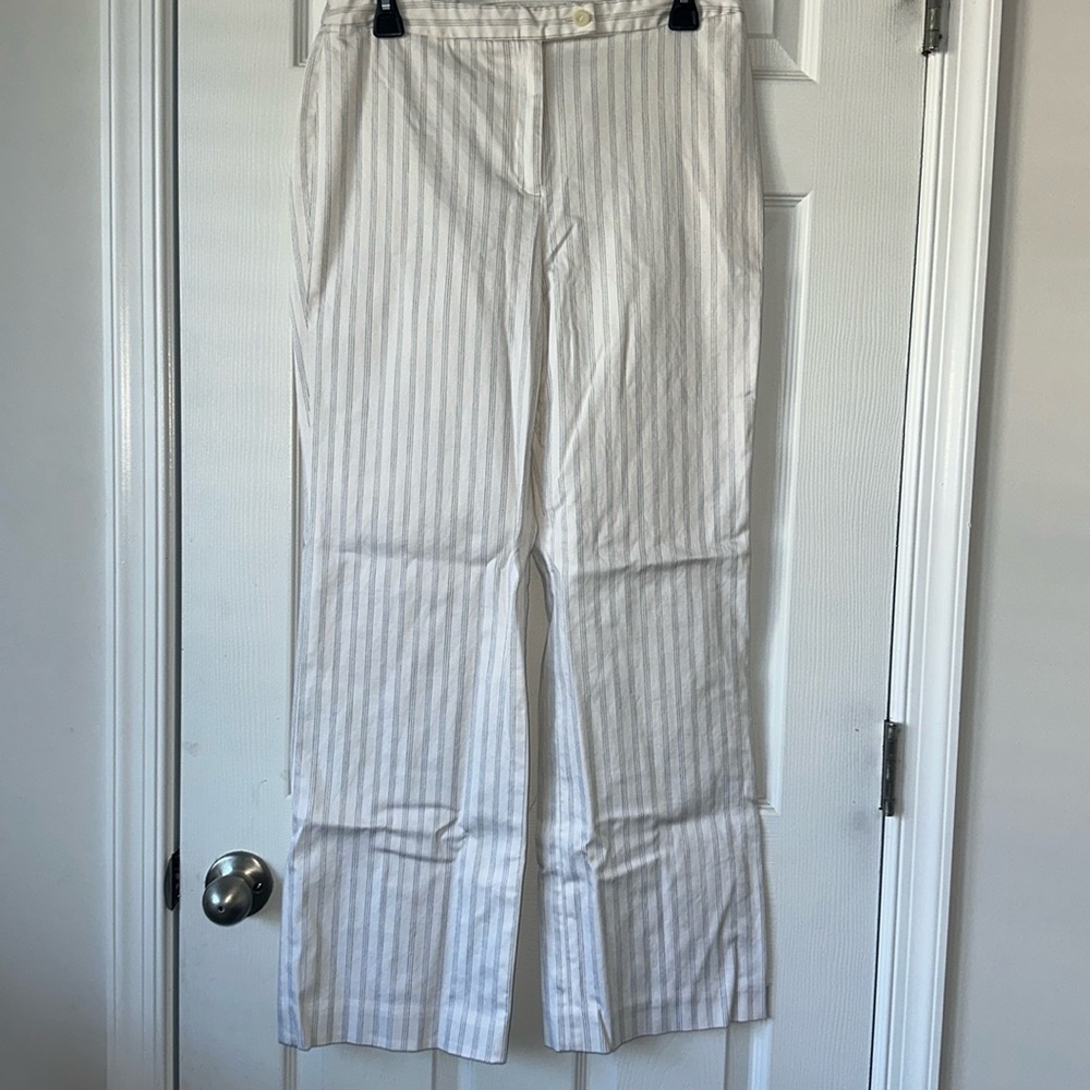 Lie white with black lining women pants  size 8, tall boot, cut good condition